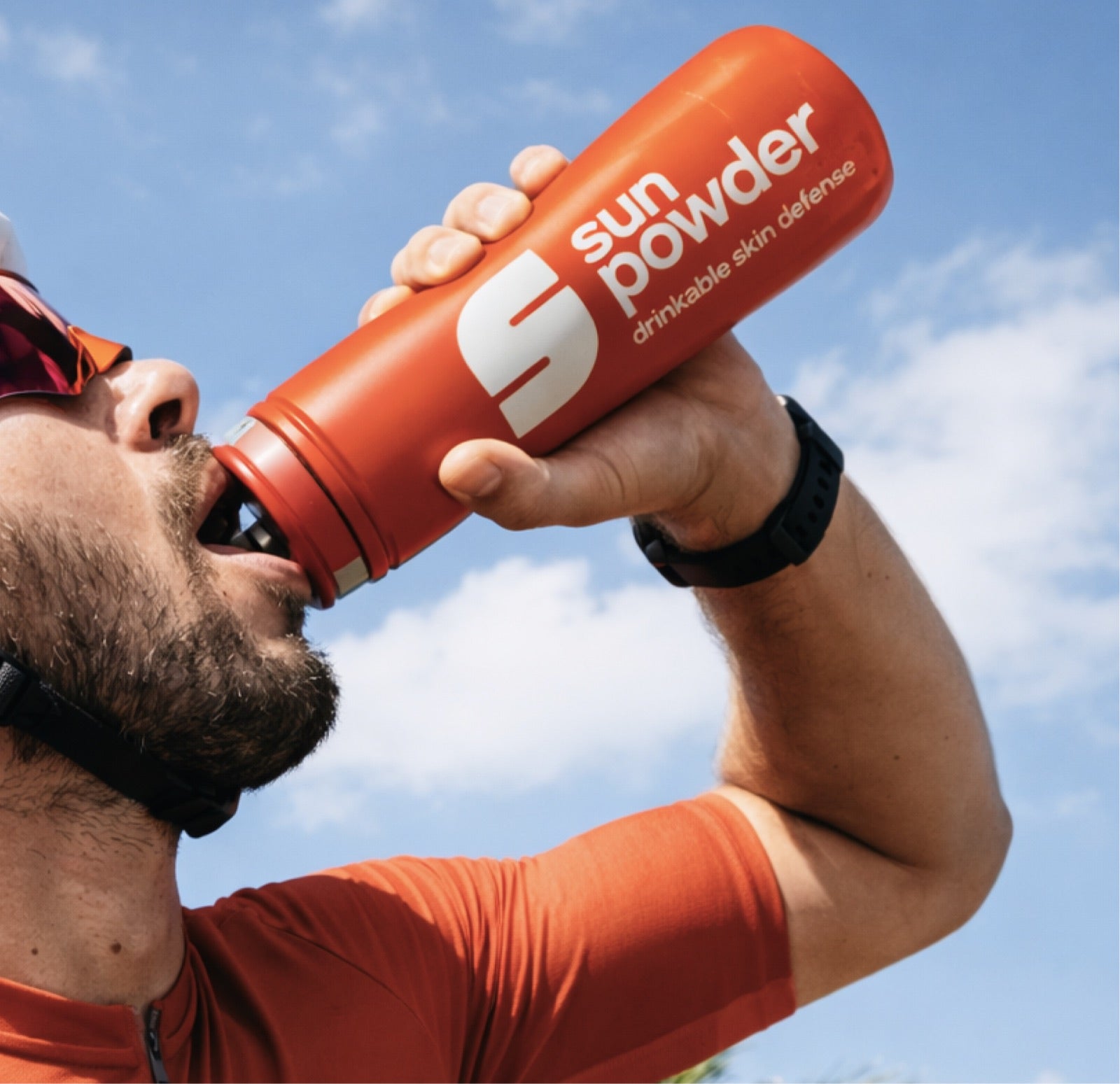 Man drinking Sun Powder outdoors