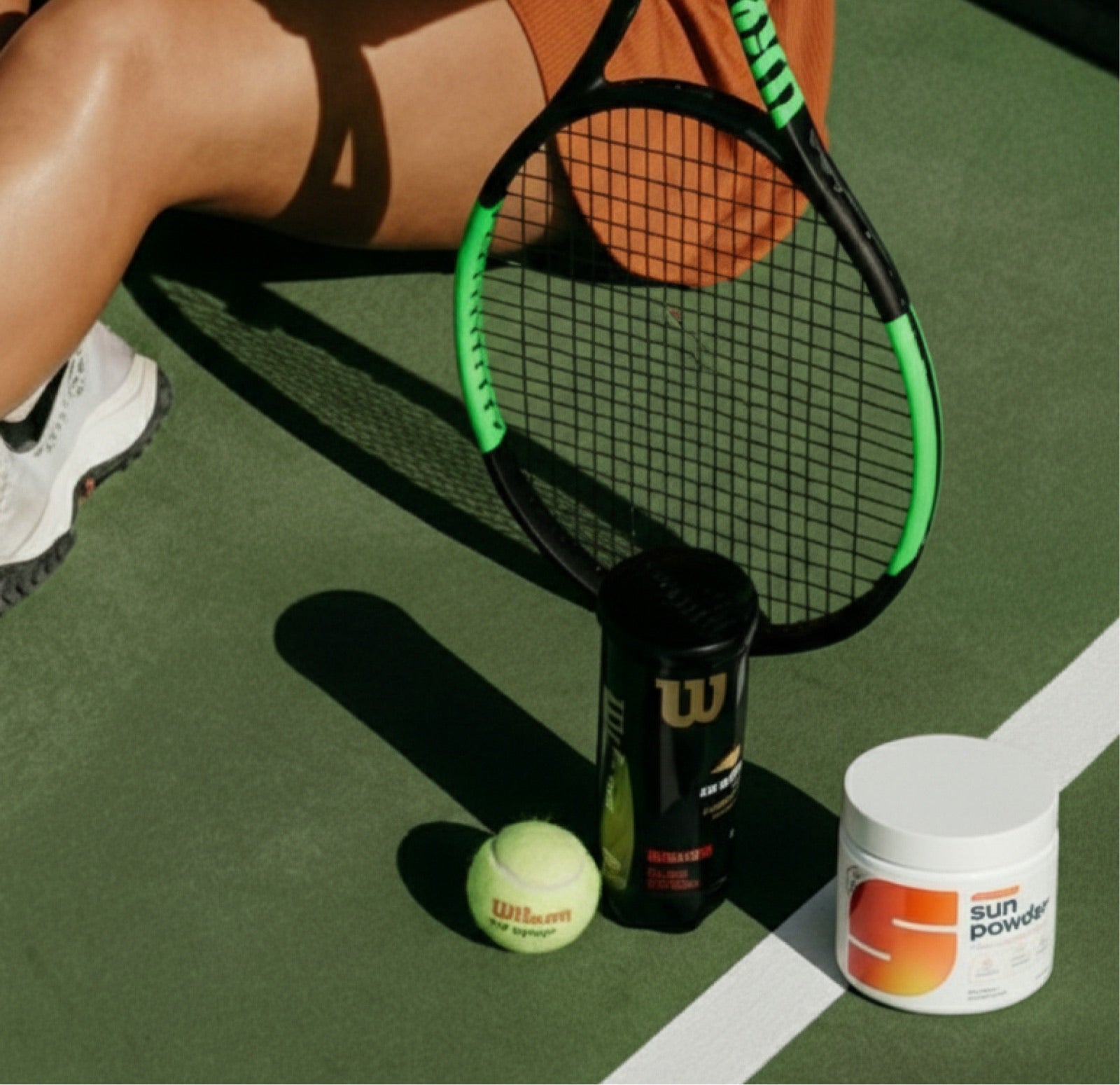 Sun Powder on a tennis court